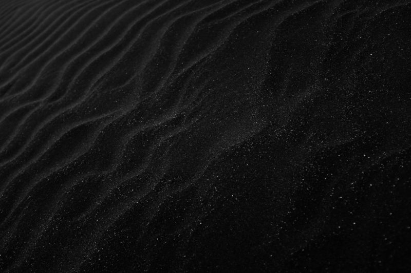 abstrakte fotografie schwarzer sand