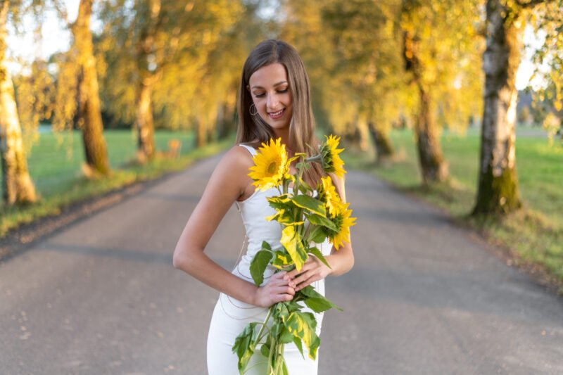 Peoplefotografie Frau mit Sonnenblume